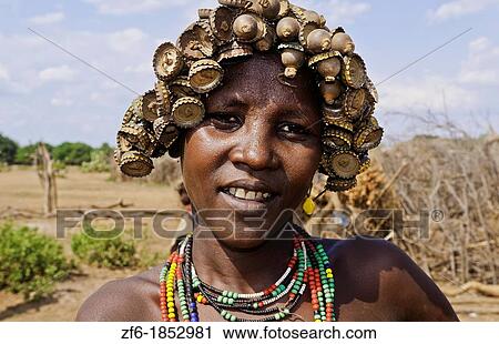 Dassnech Tribe in Omorate Ethiopia Africa Lower Omo Valley wife portrait in village with headress 26 View Large Photo Image Stock Image - Dassnech Tribe in Omorate Ethiopia Africa Lower Omo Valley wife portrait in village with headress 26. Fotosearch