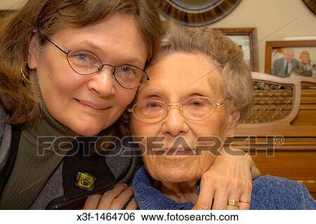 Daughter age 60 celebrating mother's 100th birthday party St Paul Minnesota MN USA View Large Photo Image Stock Photograph - Daughter age 60 celebrating mother's 100th birthday party St Paul Minnesota MN USA. Fotosearch