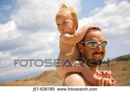 Daughter and father enjoying the resort beach in Kos Island. Greece. View Large Photo Image Stock Photo - Daughter and father enjoying the resort beach in Kos Island. Greece.. Fotosearch