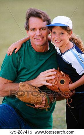 daughter hugs dad at baseball game View Large Photo Image Stock Photography - daughter hugs dad at baseball game. Fotosearch