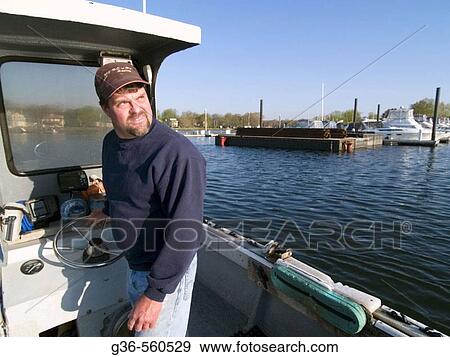 David Middleton, quahogger at work in Wickford, Rhode Island, USA View Large Photo Image Stock Photo - David Middleton, quahogger at work in Wickford, Rhode Island, USA. Fotosearch