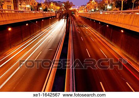 Stock Photo - dawn, circulation, Ronda de Dalt, Barcelona, Catalonia, Spain.. Fotosearch