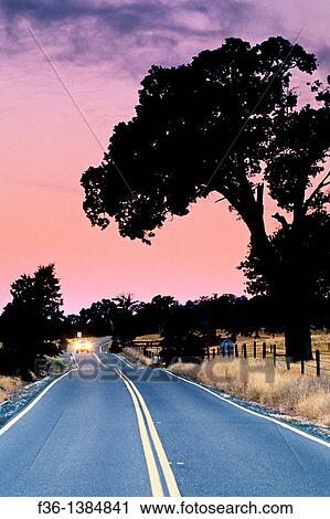 Dawn light over country road near Plymouth, Shenandoah Valley, Amador County, California View Large Photo Image Stock Image - Dawn light over country road near Plymouth, Shenandoah Valley, Amador County, California. Fotosearch