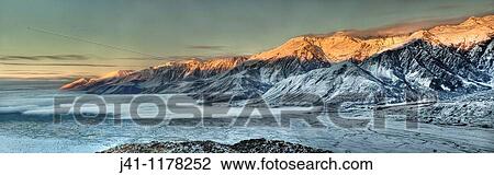Dawn on Ben Ohau Range above cloud covered Lake Pukaki from Burnett Mountains, Canterbury New Zealand. View Large Photo Image Stock Image - Dawn on Ben Ohau Range above cloud covered Lake Pukaki from Burnett Mountains, Canterbury New Zealand.. Fotosearch