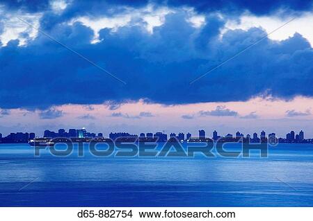 Dawn over the Rio Plata and city skyline, Punta del Este, Uruguay View Large Photo Image Picture - Dawn over the Rio Plata and city skyline, Punta del Este, Uruguay. Fotosearch