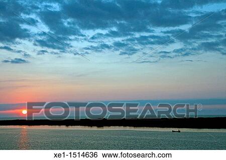 Stock Photograph - Dawn, River Ebro, Deltebre, Catalonia, Spain. Fotosearch