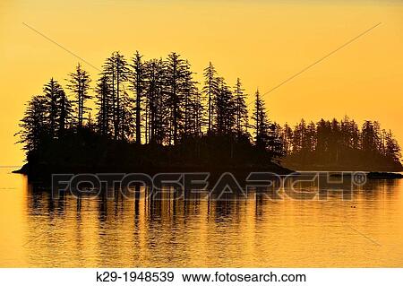 Dawn skies over Rose Harbour, Haida Gwaii (Queen Charlotte Islands) Gwaii Haanas NP, British Columbia, Canada. View Large Photo Image Stock Photo - Dawn skies over Rose Harbour, Haida Gwaii (Queen Charlotte Islands) Gwaii Haanas NP, British Columbia, Canada.. Fotosearch