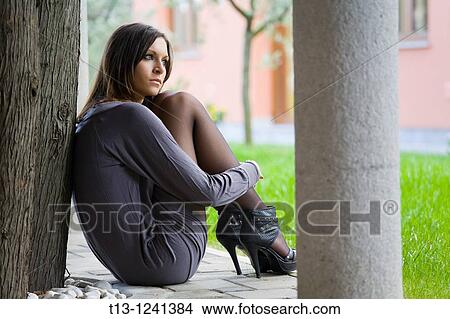 Daydreaming sexy young woman View Large Photo Image Picture - Daydreaming sexy young woman. Fotosearch