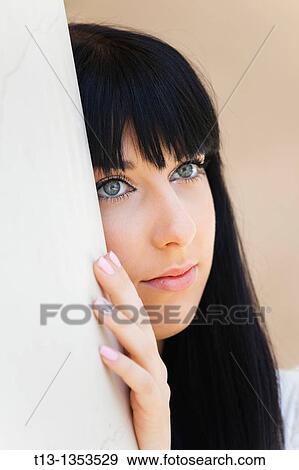 Stock Photo - Daydreaming young female face. Fotosearch