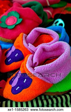 Stock Image - decorated children's shoes.. Fotosearch
