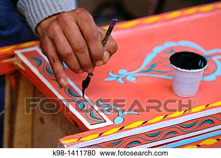 Stock Image - Decorating a closet artist carpenters Souk Marrakech Morocco Maghreb Africa. Fotosearch