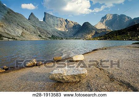 Stock Image - Deep Lake and East Temple Peak, Bridger Wilderness in the Wind River Range of the Wyoming Rocky Mountains. Fotosearch