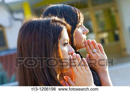 Deep meditation, two young women View Large Photo Image Stock Photo - Deep meditation, two young women. Fotosearch