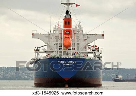 Stock Photography - deep sea freighter World Sirius anchored in English Bay, Vancouver, British Columbia, Canada. Fotosearch