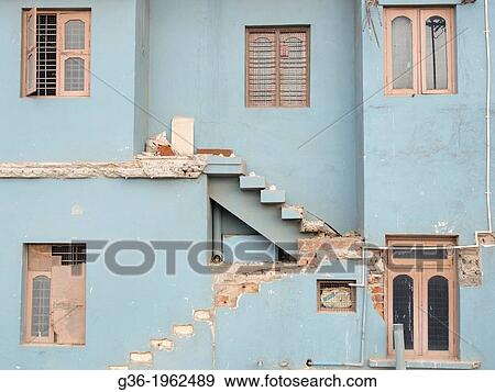 Demolished walls of a building that was partly removed to make way for upcoming highway in Yelahanka, Karnataka, India. View Large Photo Image Stock Photo - Demolished walls of a building that was partly removed to make way for upcoming highway in Yelahanka, Karnataka, India.. Fotosearch