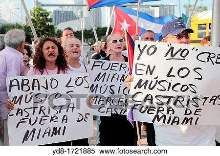 Demonstration of Cuban exiles in the United States protesting the presence of musicians living in Cuba for a visit to work in different locations in Miami, Florida, USA View Large Photo Image Stock Photography - Demonstration of Cuban exiles in the United States protesting the presence of musicians living in Cuba for a visit to work in different locations in Miami, Florida, USA. Fotosearch