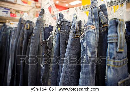 Denim jeans for sale in a thrift store in New York Because of the worldwide economic recovery leading to a rise in raw materials and labor costs the prices of clothing is expected to rise 10 percent this year View Large Photo Image Stock Image - Denim jeans for sale in a thrift store in New York Because of the worldwide economic recovery leading to a rise in raw materials and labor costs the prices of clothing is expected to rise 10 percent this year. Fotosearch