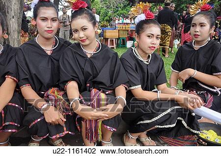 Denpasar (Bali, Indonesia): Balinese girls at the Bali Arts Festival opening View Large Photo Image Stock Image - Denpasar (Bali, Indonesia): Balinese girls at the Bali Arts Festival opening. Fotosearch