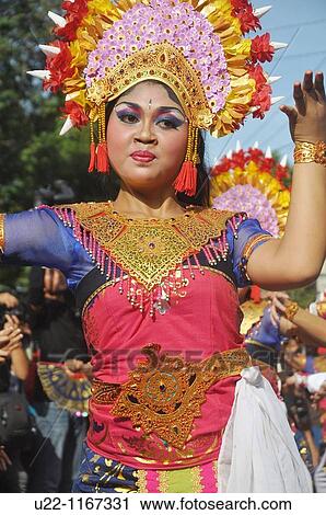 Denpasar (Bali, Indonesia): Balinese dancer on parade at the Bali Arts Festival opening View Large Photo Image Stock Image - Denpasar (Bali, Indonesia): Balinese dancer on parade at the Bali Arts Festival opening. Fotosearch