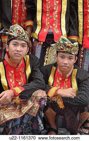 Stock Image - Denpasar (Bali, Indonesia): boys of a folkloristic group at the Bali Arts Festival opening. Fotosearch
