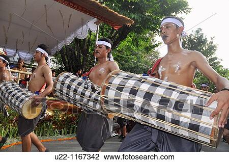 Denpasar (Bali, Indonesia): folkloristic group on parade at the Bali Arts Festival opening View Large Photo Image Stock Image - Denpasar (Bali, Indonesia): folkloristic group on parade at the Bali Arts Festival opening. Fotosearch