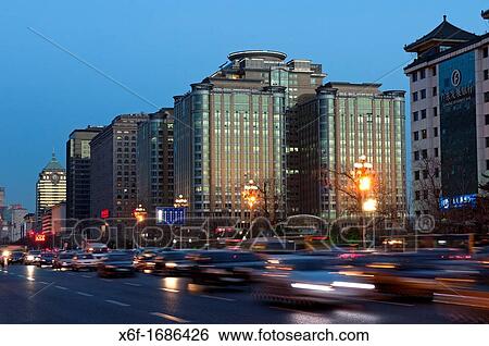 Dense traffic at the evenign rush-hour in the Dong Chang? an Avenue in the city centre of Beijing, China View Large Photo Image Stock Photograph - Dense traffic at the evenign rush-hour in the Dong Chang? an Avenue in the city centre of Beijing, China. Fotosearch