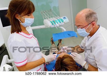 Stock Image - Dental intervention, Dental office/Dental surgery, Donostia-San SebastiBn, Guipuzcoa, Basque Country, Spain. Fotosearch