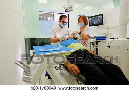 Stock Photo - Dental intervention, Dental office/Dental surgery, Donostia-San SebastiBn, Guipuzcoa, Basque Country, Spain. Fotosearch