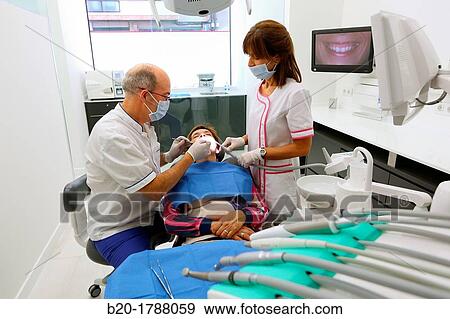 Dental intervention, Dental office/Dental surgery, Donostia-San SebastiBn, Guipuzcoa, Basque Country, Spain View Large Photo Image Stock Photo - Dental intervention, Dental office/Dental surgery, Donostia-San SebastiBn, Guipuzcoa, Basque Country, Spain. Fotosearch