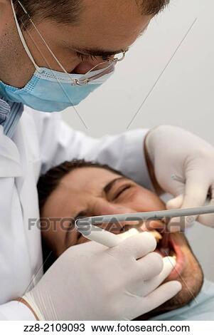 Dentist working on patient's teeth Beirut Lebanon Middle East. View Large Photo Image Stock Image - Dentist working on patient's teeth Beirut Lebanon Middle East.. Fotosearch