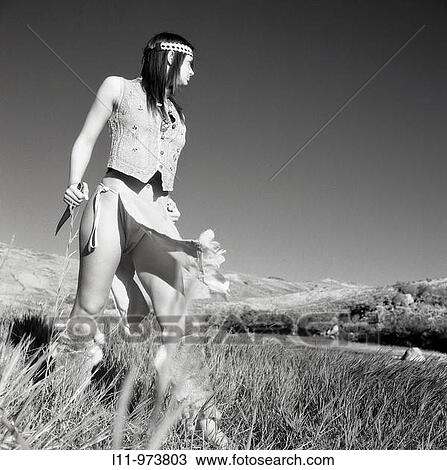 Stock Image - Depiction of indigenous woman, american plains; circa 1870.. Fotosearch