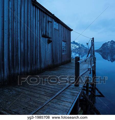 Derelict Rorbu sits on edge of fjord, Vestvalen, Reine, Moskenesoy, Lofoten Islands, Norway View Large Photo Image Stock Photo - Derelict Rorbu sits on edge of fjord, Vestvalen, Reine, Moskenesoy, Lofoten Islands, Norway. Fotosearch