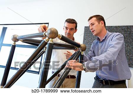 Stock Photo - Design team of industrial systems, Dematerialised Manufacturing Systems, Research in Industrial Systems, R & D + i, Tecnalia Research and Innovation, Donostia, San Sebastian, Gipuzkoa, Basque Country, Spain. Fotosearch
