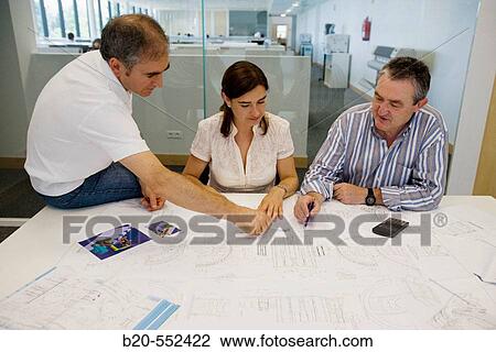 Designers looking at blueprints. Fatronik Foundation, Research Technology Center. Donostia, San Sebastian, Gipuzkoa, Euskadi. Spain. View Large Photo Image Stock Image - Designers looking at blueprints. Fatronik Foundation, Research Technology Center. Donostia, San Sebastian, Gipuzkoa, Euskadi. Spain.. Fotosearch