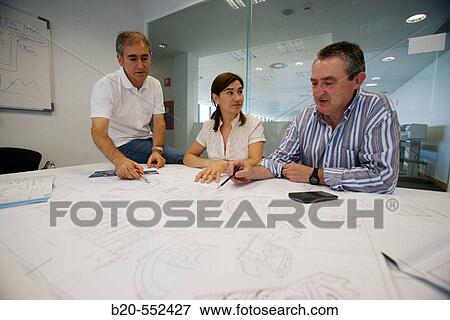 Designers looking at blueprints. Fatronik Foundation, Research Technology Center. Donostia, San Sebastian, Gipuzkoa, Euskadi. Spain. View Large Photo Image Stock Photo - Designers looking at blueprints. Fatronik Foundation, Research Technology Center. Donostia, San Sebastian, Gipuzkoa, Euskadi. Spain.. Fotosearch