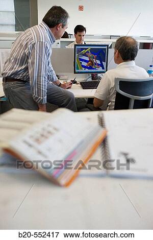 Designers working with PCs. Cad Cam. Fatronik Foundation, Research Technology Center. Donostia-San SebastiBn, Euskadi. Spain. View Large Photo Image Stock Photo - Designers working with PCs. Cad Cam. Fatronik Foundation, Research Technology Center. Donostia-San SebastiBn, Euskadi. Spain.. Fotosearch