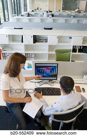 Stock Photo - Designers working with PCs. MEF Calculations. Fatronik Foundation, Research Technology Center. Donostia-San SebastiBn, Euskadi. Spain. Fotosearch