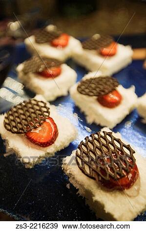 Stock Photo - Dessert with chocolate and strawberries in pastry shop, Istanbul, Marmara Province, Turkey, Europe.. Fotosearch