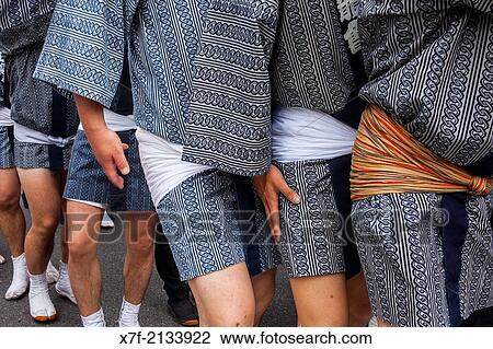 Stock Image - Detail, bearers of Mikoshi, Sanja Matsuri Festival, in Kaminarimon dori, next to Sensoji Temple, Asakusa, Tokyo, Japan, Asia.. Fotosearch