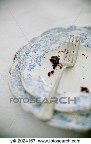 Detail of a fork and crumbs of a chocolate cake. View Large Photo Image Stock Photo - Detail of a fork and crumbs of a chocolate cake.. Fotosearch