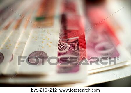 Stock Image - Detail of a grup of 50 pounds, English currency. England, UK.. Fotosearch