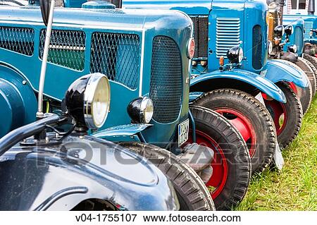 Detail of a row of vintage tractors, Germany, Europe View Large Photo Image Stock Photo - Detail of a row of vintage tractors, Germany, Europe. Fotosearch