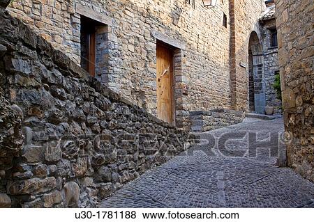 Detail of a street of medieval A? nsa village, in Sobrarbe region, declarated Historical-Artistic Site Huesca, Arag? n, Spain View Large Photo Image Stock Photo - Detail of a street of medieval A? nsa village, in Sobrarbe region, declarated Historical-Artistic Site Huesca, Arag? n, Spain. Fotosearch