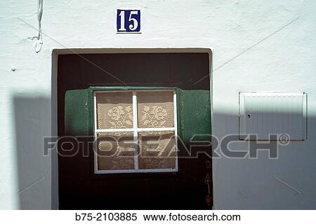 Detail of a typical front door with the number 15. Fornells, Menorca, Spain, Balearic Islands. View Large Photo Image Stock Photography - Detail of a typical front door with the number 15. Fornells, Menorca, Spain, Balearic Islands.. Fotosearch