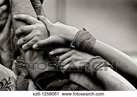 Detail of Castellers, Catalan human castles declared UNESCO element of Intangible Cultural Heritage of Humanity View Large Photo Image Stock Image - Detail of Castellers, Catalan human castles declared UNESCO element of Intangible Cultural Heritage of Humanity. Fotosearch
