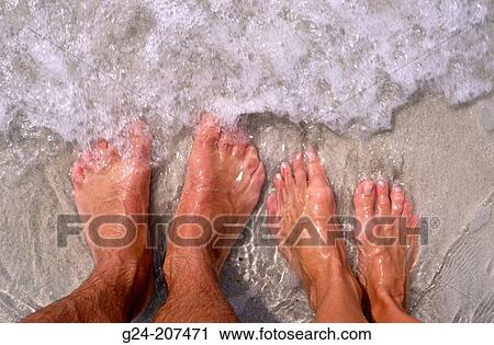 Detail of couple's feet at beach. Thailand View Large Photo Image Stock Image - Detail of couple's feet at beach. Thailand. Fotosearch