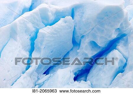 Stock Image - Detail of crumbling ice sheets in Perito Moreno. Glacier National Park. Argentina.. Fotosearch