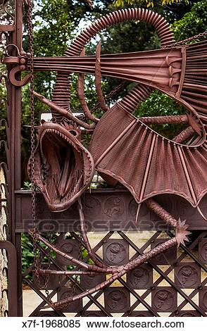 Detail of dragon on iron gate at Pavellons de la Finca Guell, by Antonio Gaudi. Barcelona. Catalonia. Spain. View Large Photo Image Stock Photography - Detail of dragon on iron gate at Pavellons de la Finca Guell, by Antonio Gaudi. Barcelona. Catalonia. Spain.. Fotosearch