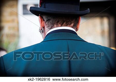 Stock Photograph - Detail of earings, Deptford Jack event, London, UK. Fotosearch