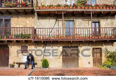 Detail of facade in Els Hostalets d? en Bas, Garrotxa, Girona province Catalonia Spain View Large Photo Image Stock Photograph - Detail of facade in Els Hostalets d? en Bas, Garrotxa, Girona province Catalonia Spain. Fotosearch